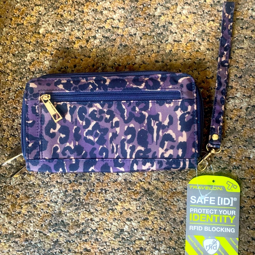 Travelon RFID Wallet with Wristlet.  Color is purple leopard.  NWT